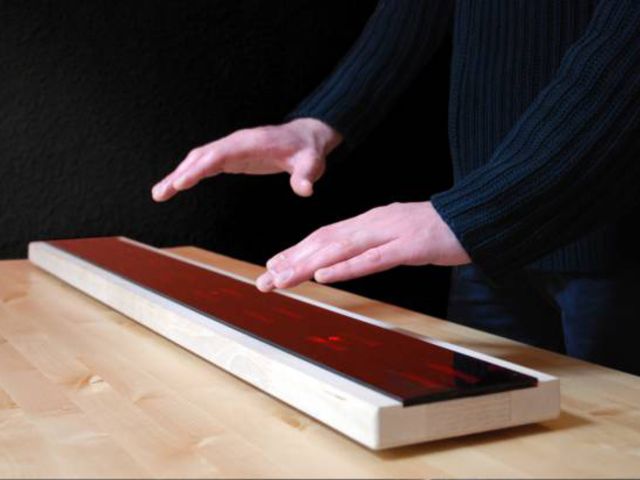 The AirPiano's infrared sensors track the movements of your hands.